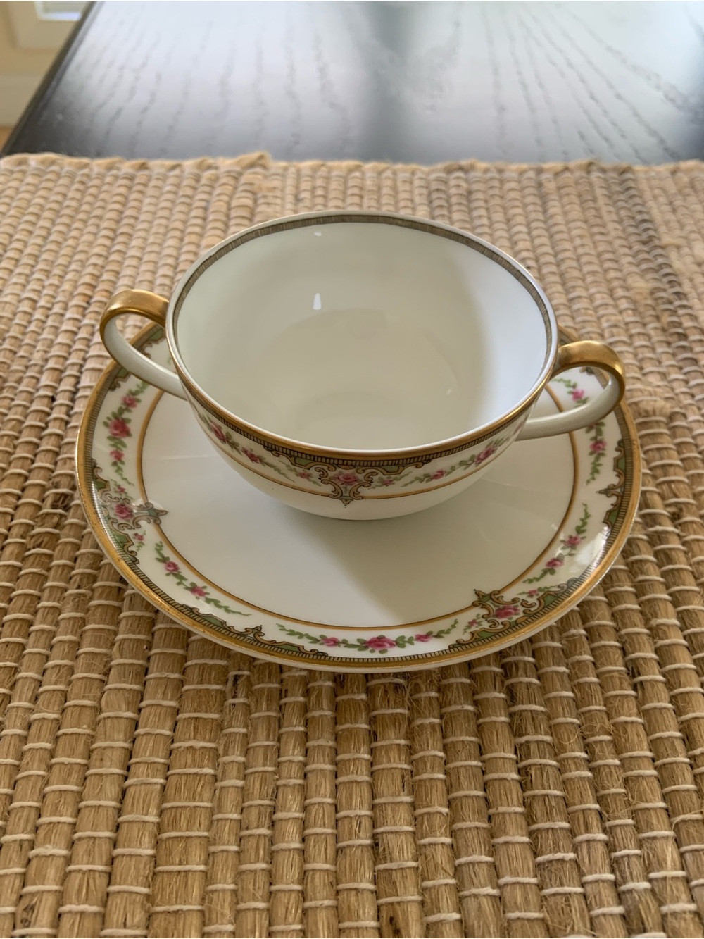 Elegant Two-Handled Cream and Gold Bone China Cup with Saucer